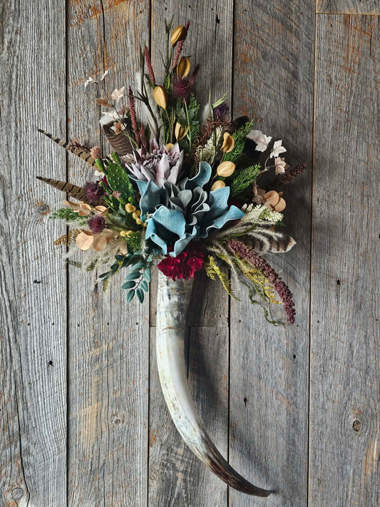 Longhorn floral arrangement art decor.